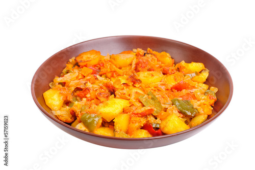 Vegetable ragout on bowl isolated on white background