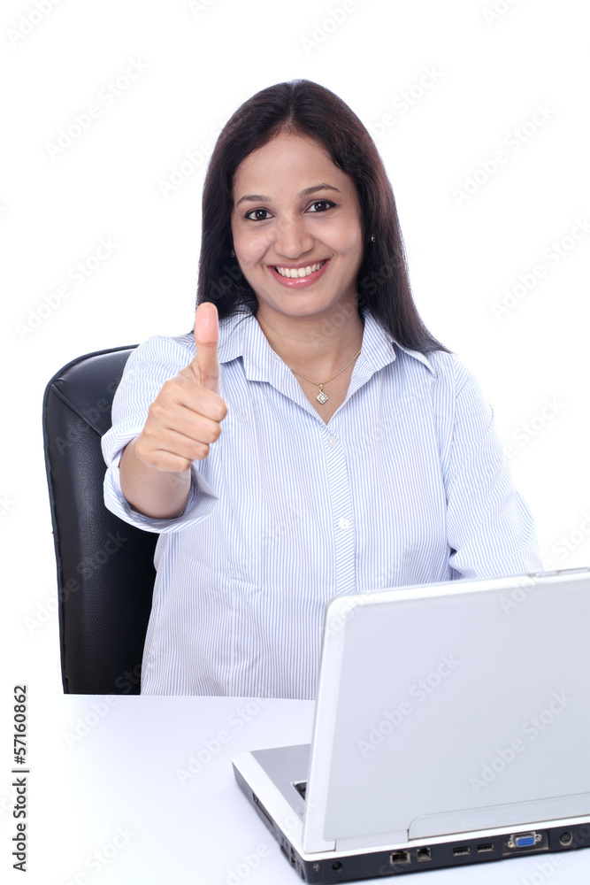 Happy young buisiness woman showing thumbs up Happy young buisiness woman showing thumbs up