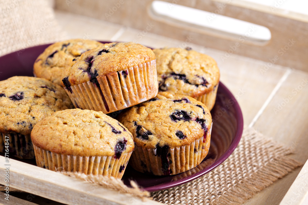 Healthy blueberry banana muffins on a tray