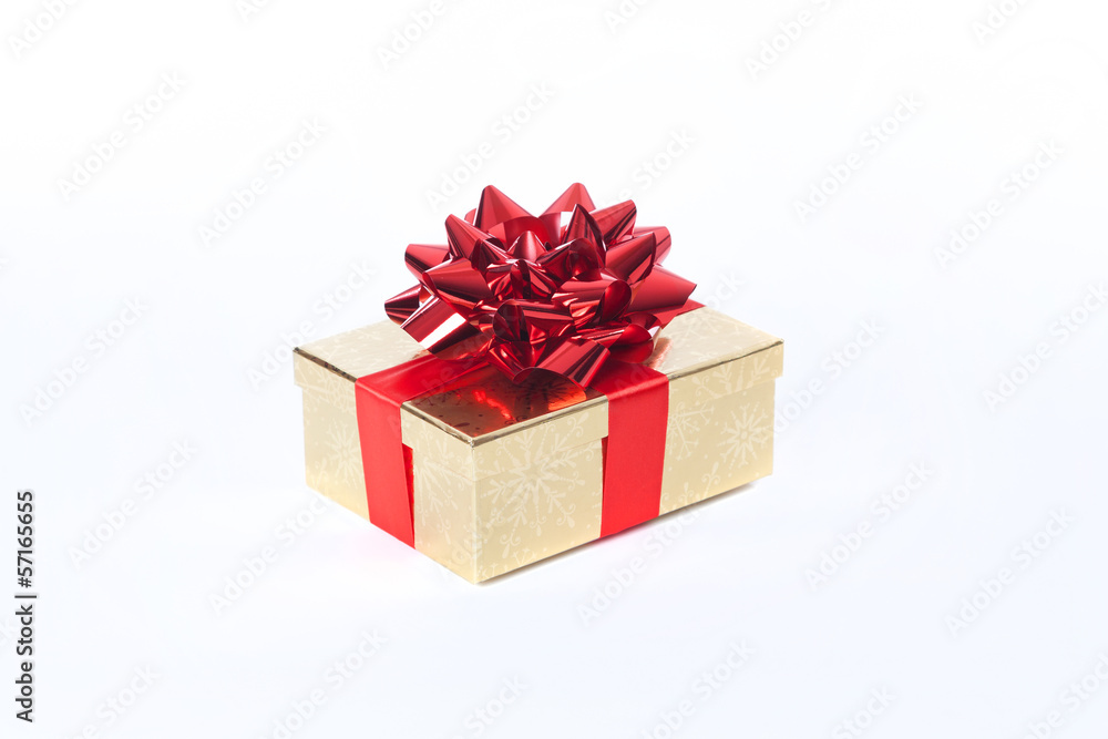 Obraz premium Weihnachtsgeschenk gold mit roter Schleife