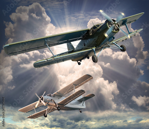 Canvas Print Retro style picture of the biplanes. Transportation theme.