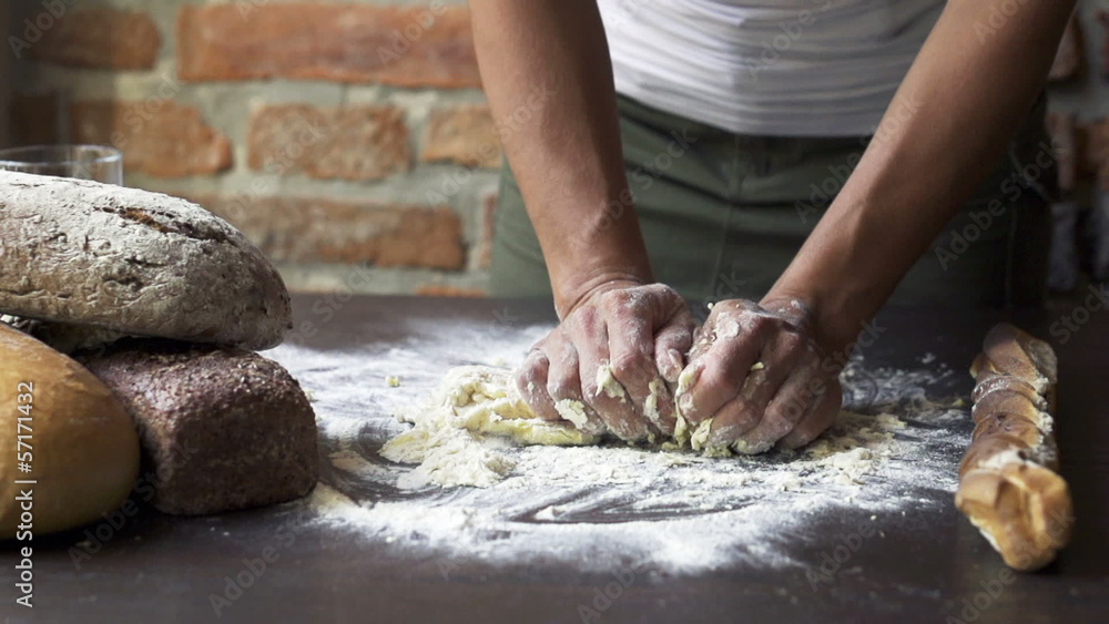 woman kneading the dough, slow motion at 60 fps