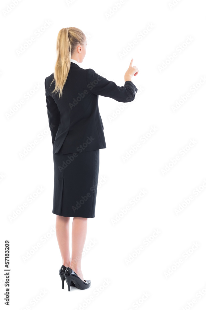 Young blonde businesswoman pointing Young blonde businesswoman pointing