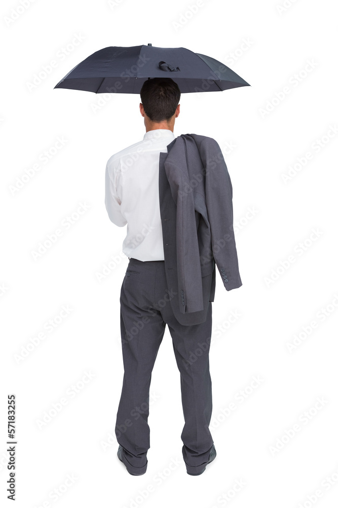 Businessman standing back to camera holding umbrella and jacket Businessman standing back to camera holding umbrella and jacket
