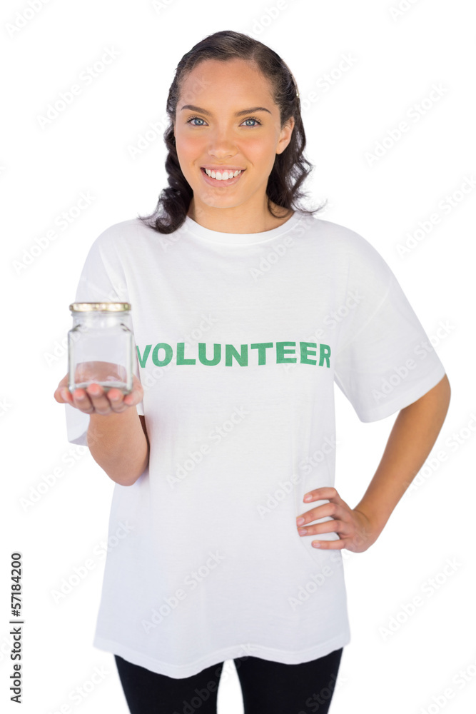 Pretty volunteer woman holding jar Pretty volunteer woman holding jar