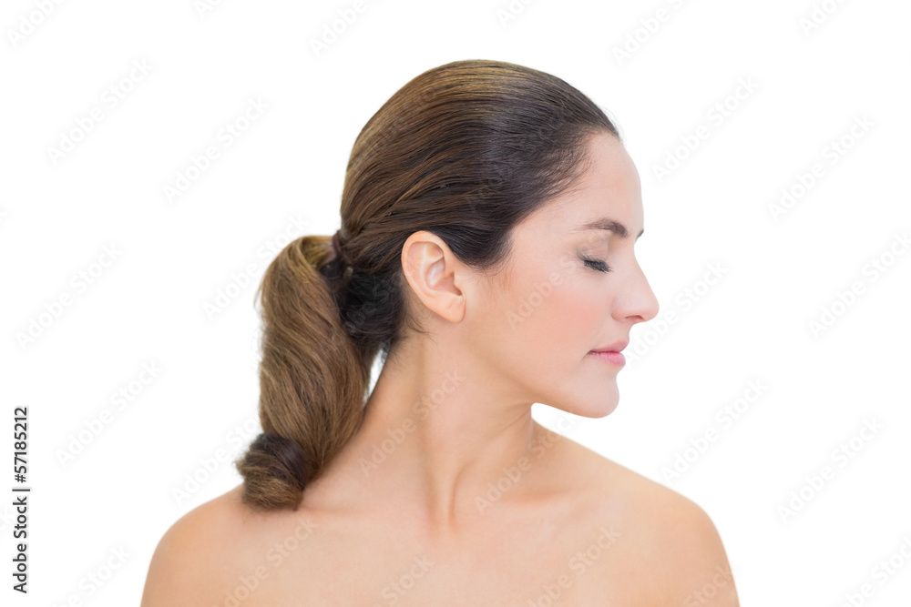 Peaceful bare brunette turning head right with closed eyes Peaceful bare brunette turning head right with closed eyes