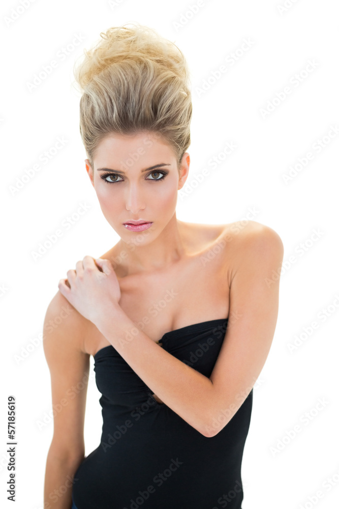 Unsmiling beautiful blonde model looking at camera Unsmiling beautiful blonde model looking at camera