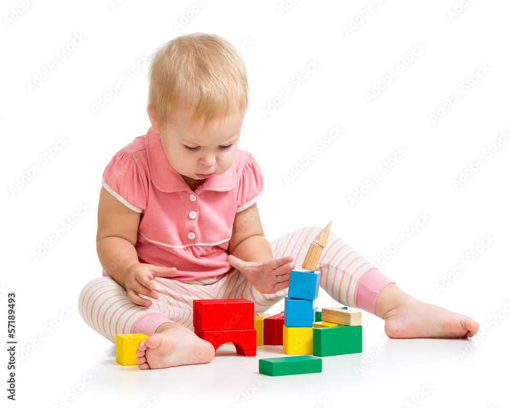 kid girl playing with wooden toys kid girl playing with wooden toys