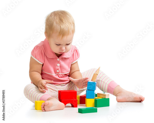 kid girl playing with woode...