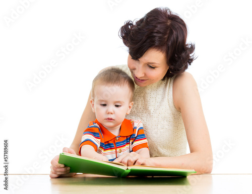 mother reading a book to he...