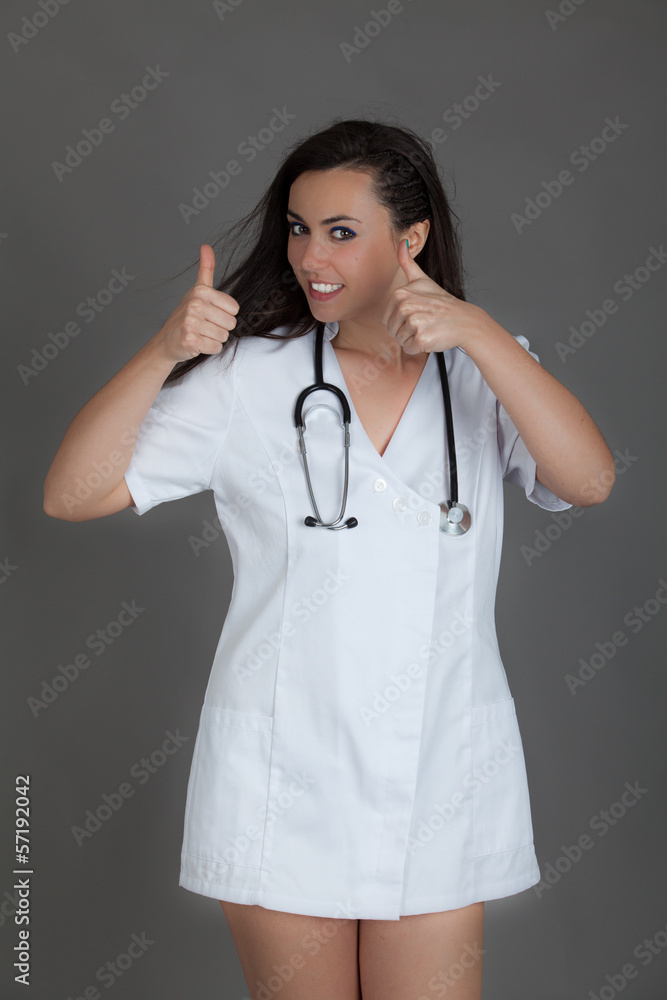 Woman doctor on grey background Woman doctor on grey background
