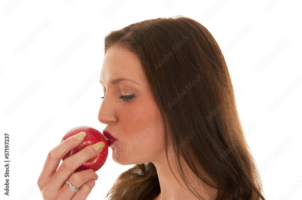 Girl red lips kissing apple Girl red lips kissing apple