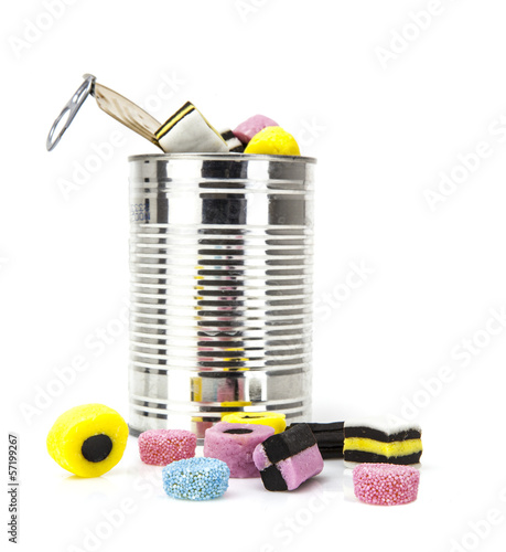 liquorice allsorts in a tin isolated on a white background