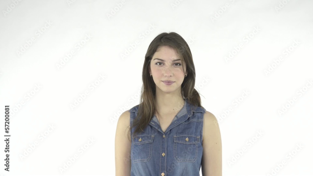 Happy young lady smiling at the camera Happy young lady smiling at the camera