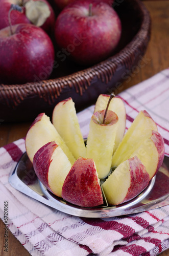 Cutting apple with metal cutter