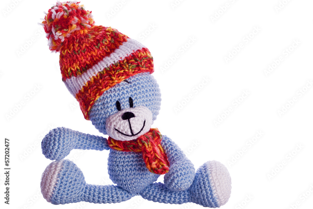teddy bear with scarf and bobble cap in winter teddy bear with scarf and bobble cap in winter