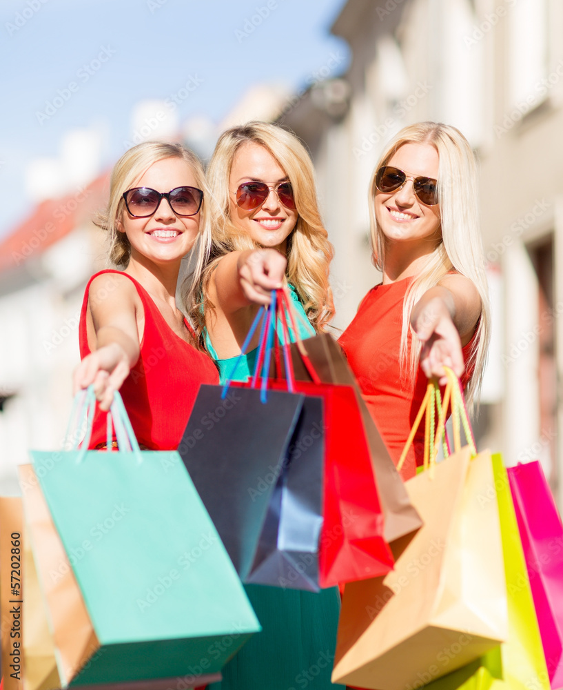 beautiful women with shopping bags in the ctiy beautiful women with shopping bags in the ctiy