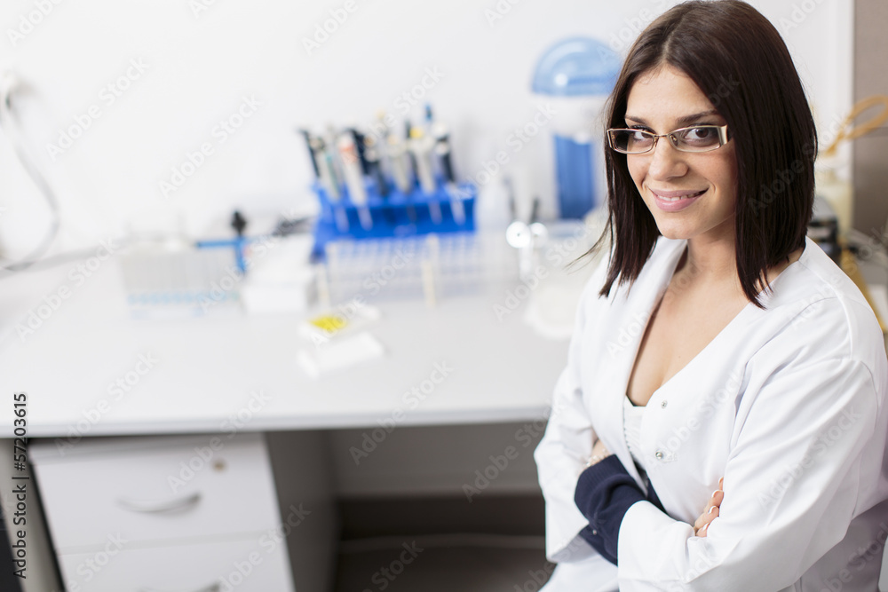 Young woman in modern medical laboratory Young woman in modern medical laboratory