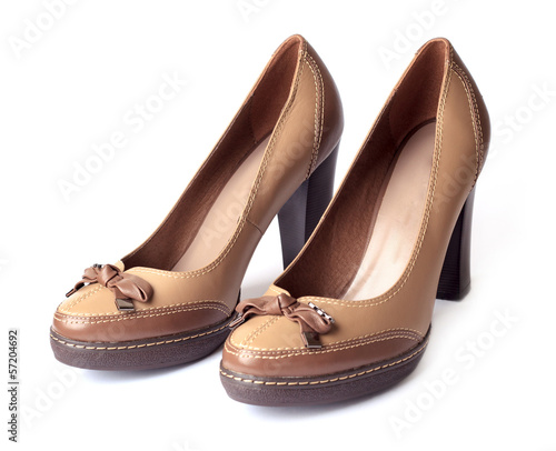 Elegant pair of woman's shoes isolated on a white background