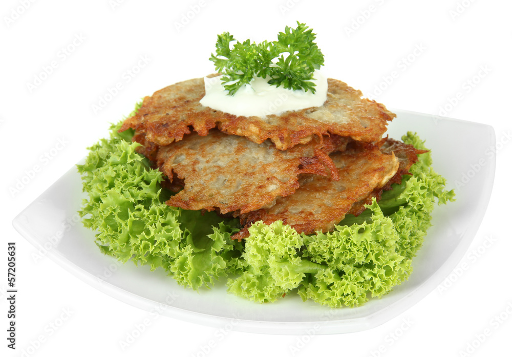 Potato pancakes on plate, isolated on white Potato pancakes on plate, isolated on white
