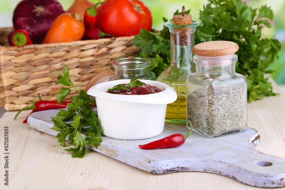 Raw liver in bowl with spices and condiments Raw liver in bowl with spices and condiments