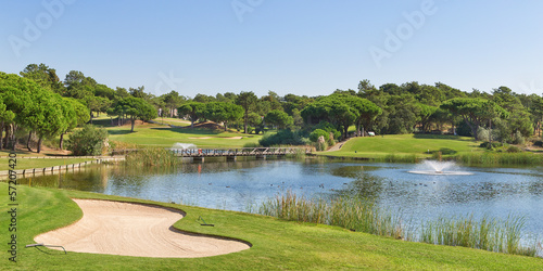 Sports golf park in Portugal. Near lake and fountain.