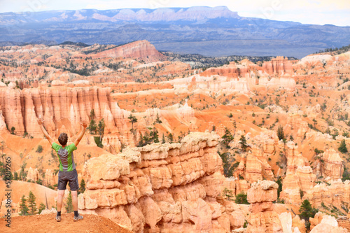 Cheering celebrating happy hiker in Bryce Canyon