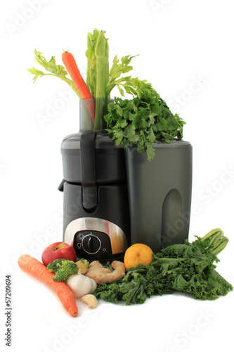 Juicing fresh vegetables and fruit