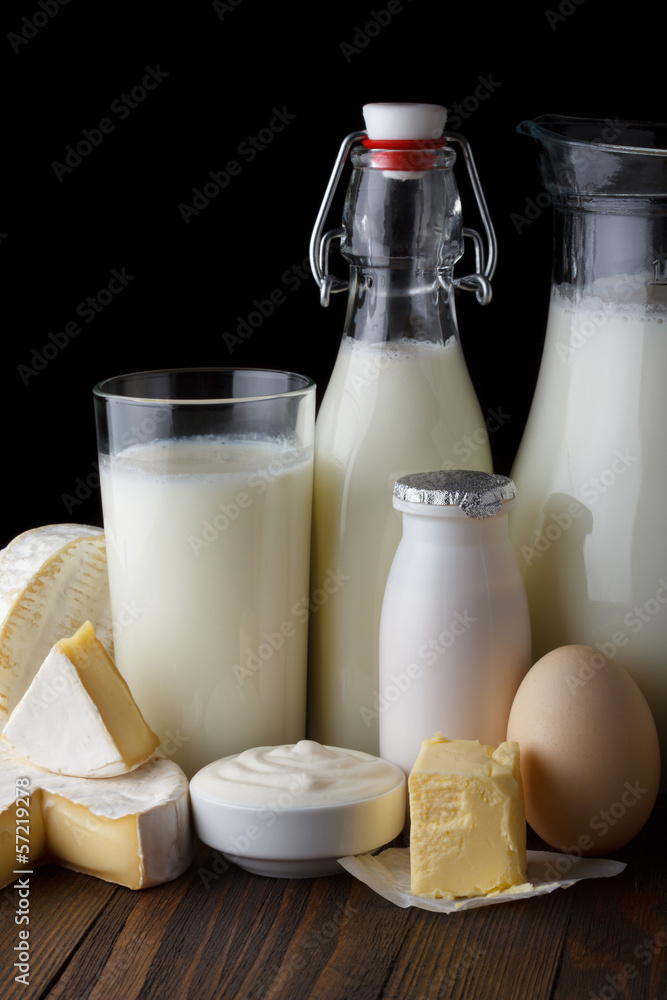 Dairy products on wooden table close-up Dairy products on wooden table close-up