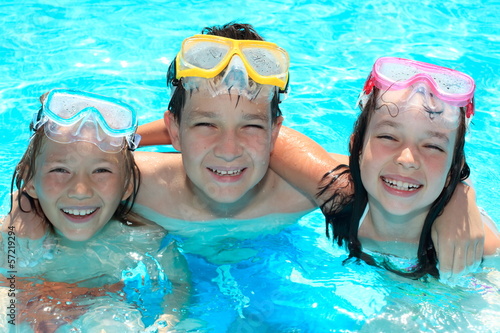 Smiling children in swimming pool © Marzanna Syncerz