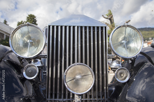 Vintage car details lights and grille, close-up, selective focus © perfectmatch