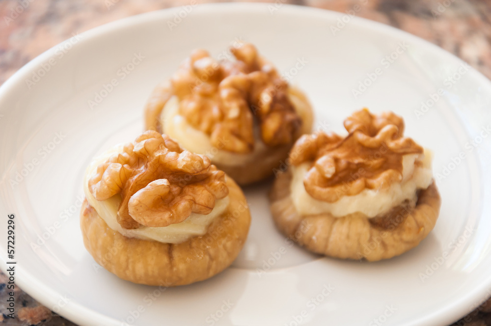 Dessert - figs with walnuts and cream Dessert - figs with walnuts and cream