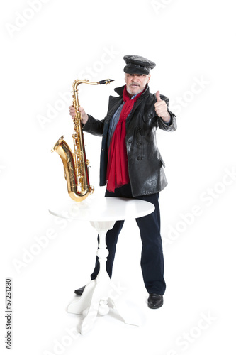 man with trumpet showing trumb photo