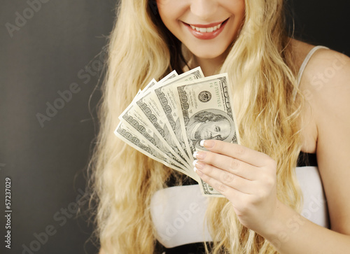 Girl holding 500 dollars