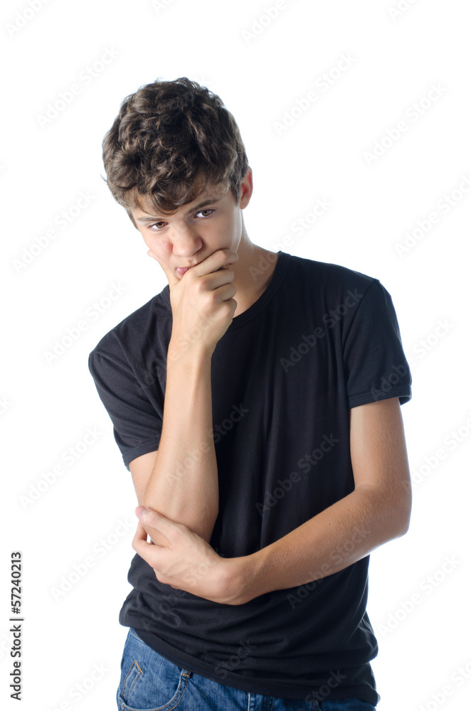 Dubious thoughtful teen boy thinking Dubious thoughtful teen boy thinking