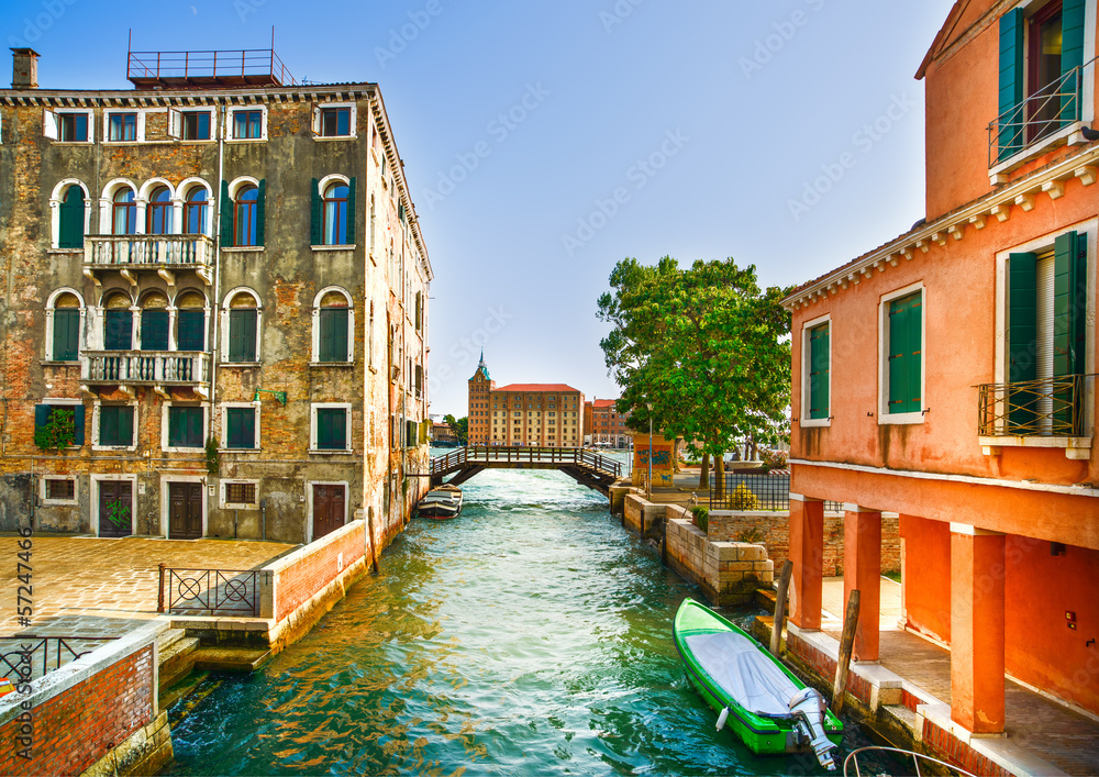 Venice cityscape, boats, water canal, bridge and traditional bui