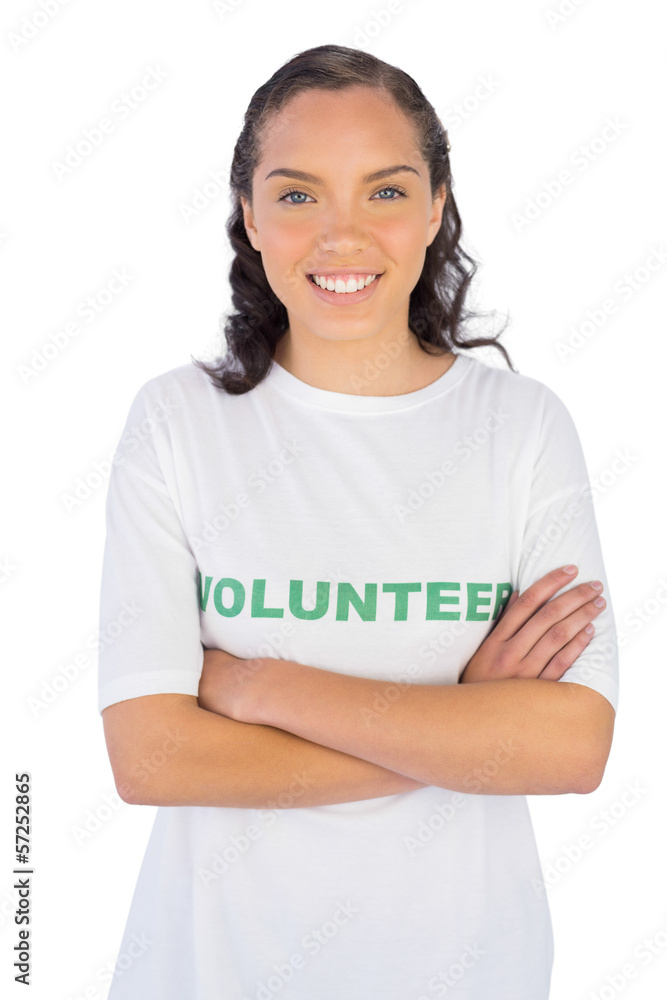 Woman wearing volunteer tshirt with arms crossed Woman wearing volunteer tshirt with arms crossed