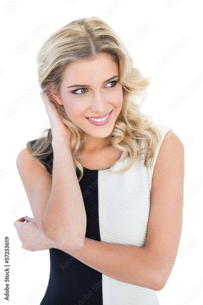 Smiling blonde model looking away Smiling blonde model looking away