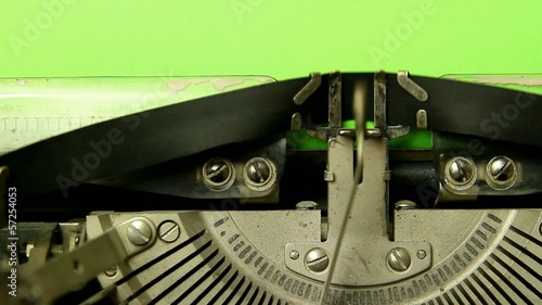 close up typewriter type blank sign on green screen paper