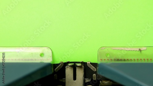 close up typewriter type blank sign on green screen paper