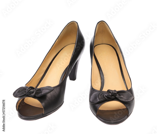 Pair of black woman shoes.