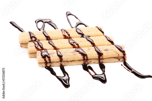 Obraz na plátně Stream chocolate on stics of biscuit.