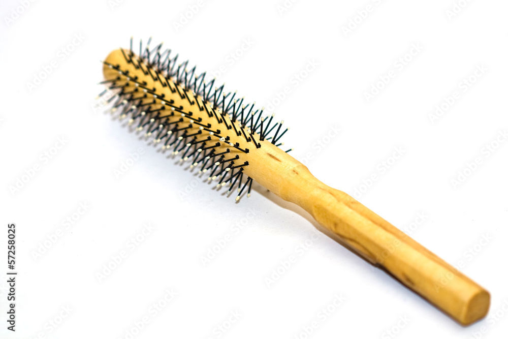 Wooden Comb on white backgraound Wooden Comb on white backgraound