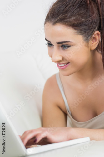 Pretty woman working with her laptop © WavebreakMediaMicro