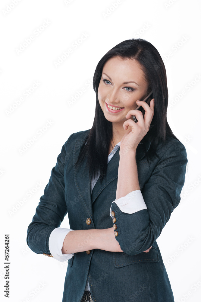 Young business lady talking by phone and smile. Young business lady talking by phone and smile.