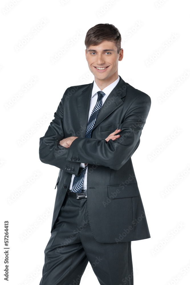 Friendly and smiling businessman looking at camera Friendly and smiling businessman looking at camera