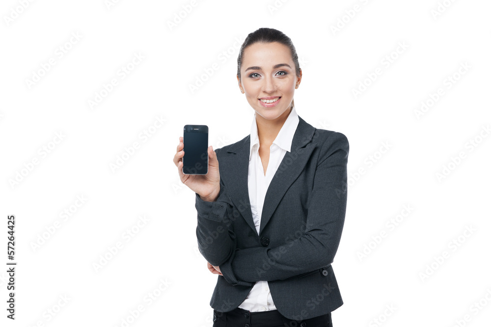 Smiling businesswoman showing cell phone. Smiling businesswoman showing cell phone.