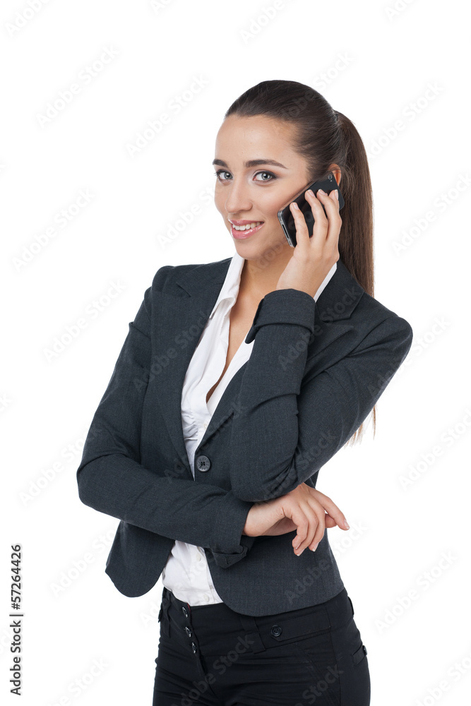 Beautiful business woman talking by phone. Beautiful business woman talking by phone.
