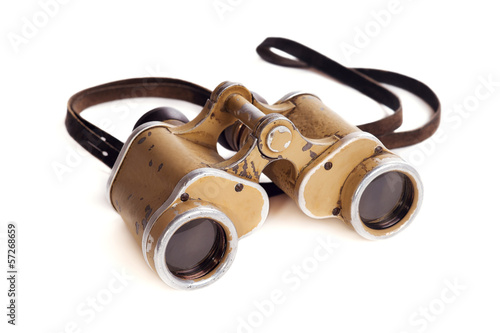 Old German military binoculars on a white background