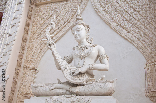 Thai angel statue depict play music